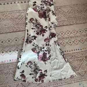 I’m selling this lovely dress because it doesn’t fit me anymore.